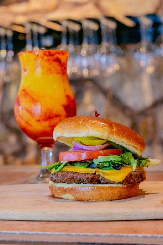 Our famous Bistro Burger paired with the delicious New Mexico Sunrise frozen wine cocktail.